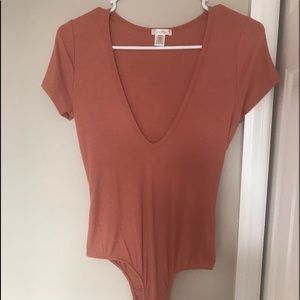 Low cut peach bodysuit